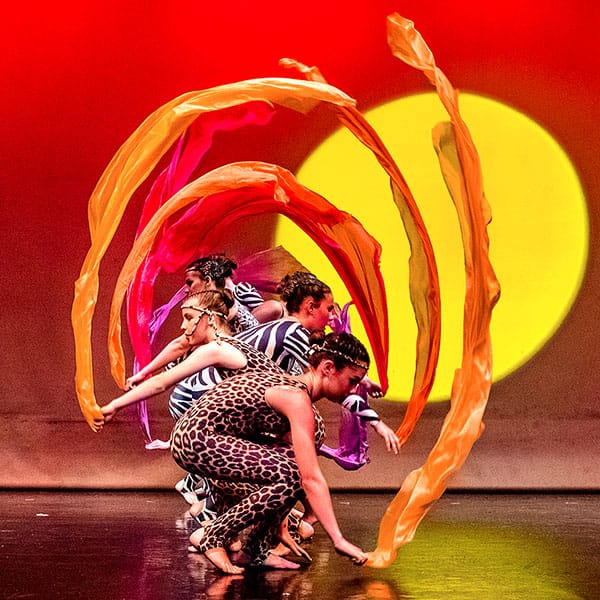 dancers ion stage in lion king routine by dance photographer in Fife